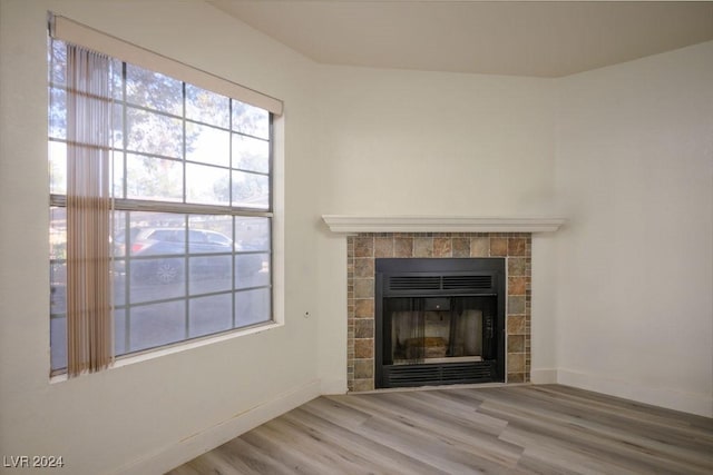 567 Kristin Ln, Henderson, NV 89011 - detailed view of wood finished floors, a fireplace, and baseboards