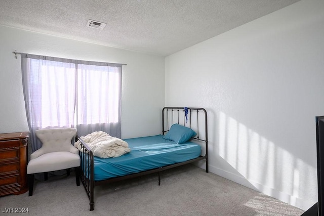 567 Kristin Ln, Henderson, NV 89011 - carpeted bedroom featuring a textured ceiling