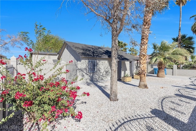 rear view of property featuring a patio area