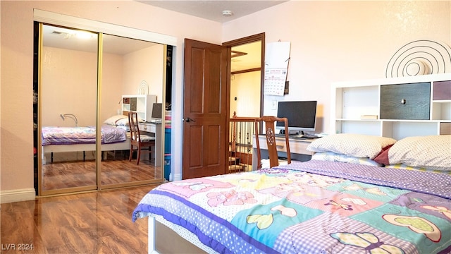 bedroom featuring a closet and wood-type flooring