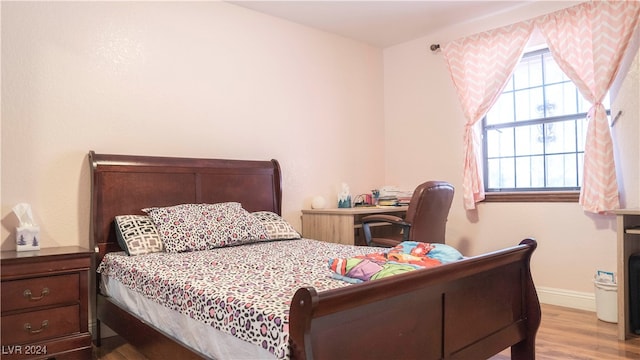 bedroom featuring light hardwood / wood-style floors