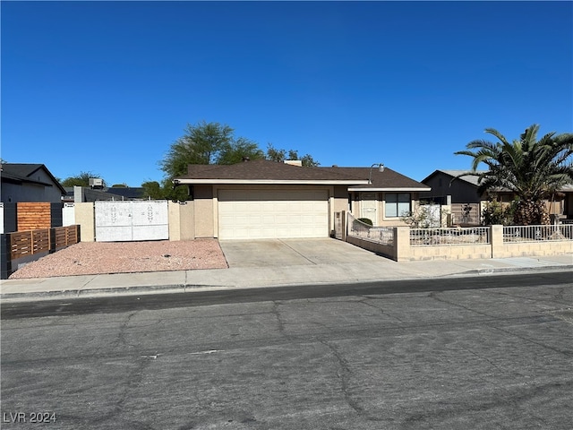 ranch-style home with a garage