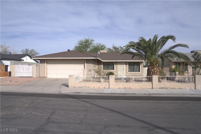 ranch-style home with a garage