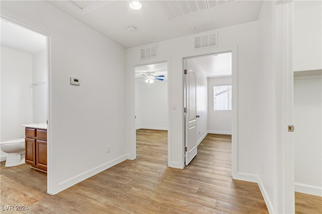 hallway featuring light hardwood / wood-style floors