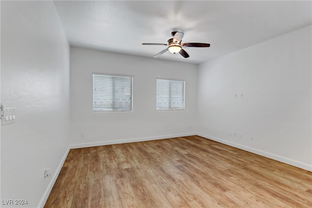 unfurnished room with light hardwood / wood-style floors and ceiling fan