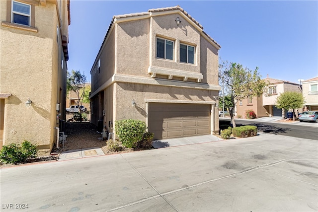 view of front of home with a garage