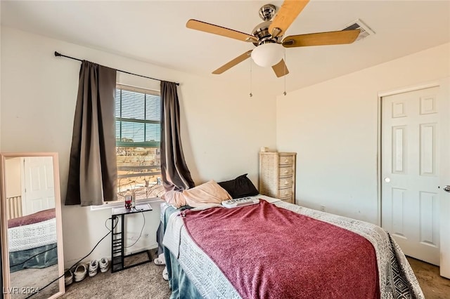 bedroom featuring ceiling fan and carpet flooring