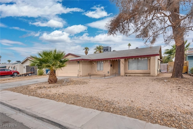 single story home with a garage