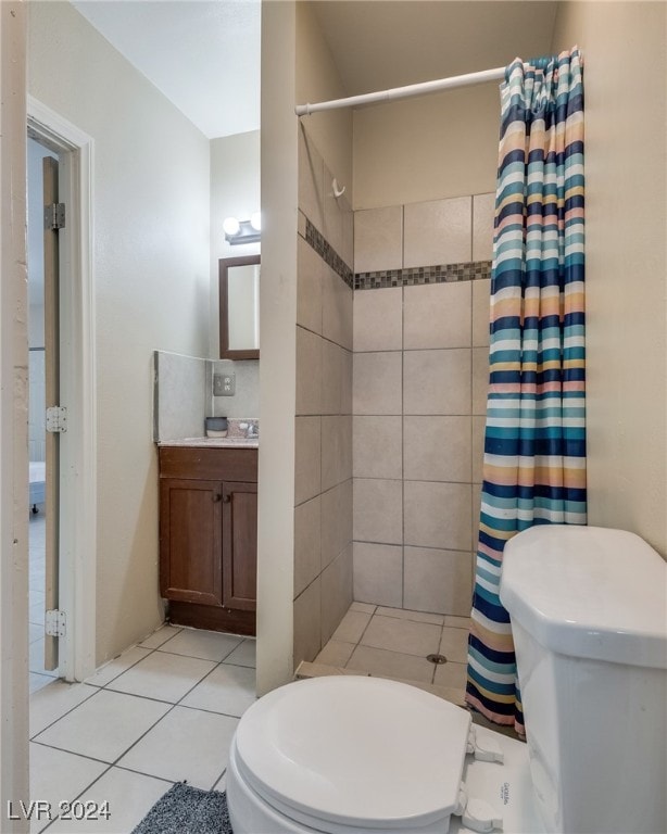 bathroom with toilet, vanity, a shower with shower curtain, and tile patterned flooring