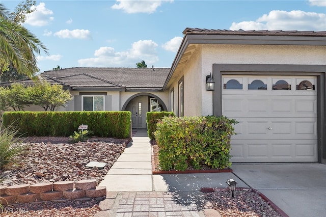 ranch-style house with a garage