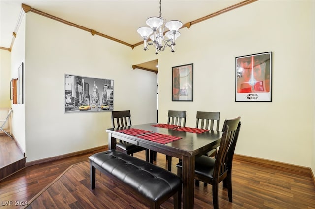 dining area with crown molding, dark hardwood / wood-style flooring, and a notable chandelier