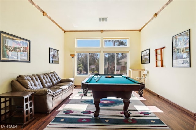 rec room featuring ornamental molding, pool table, and dark hardwood / wood-style flooring