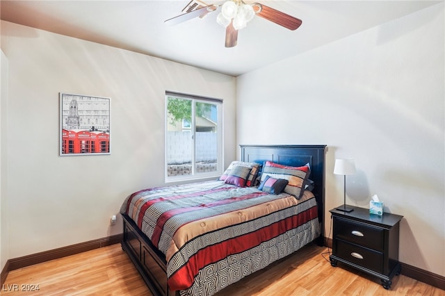 bedroom featuring light wood-type flooring and ceiling fan