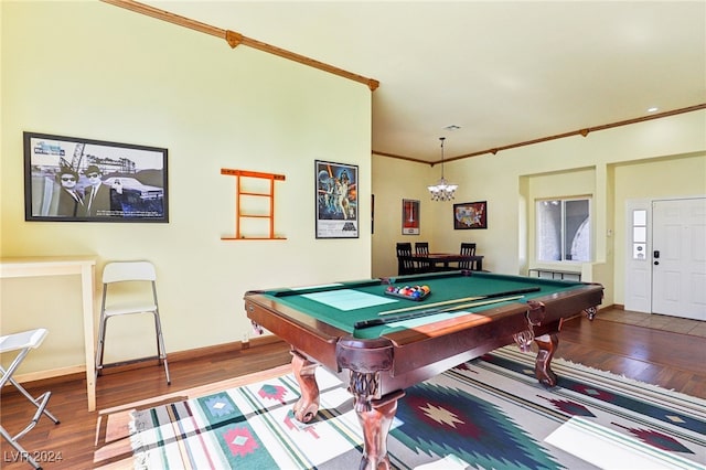 game room with a chandelier, hardwood / wood-style flooring, billiards, and crown molding