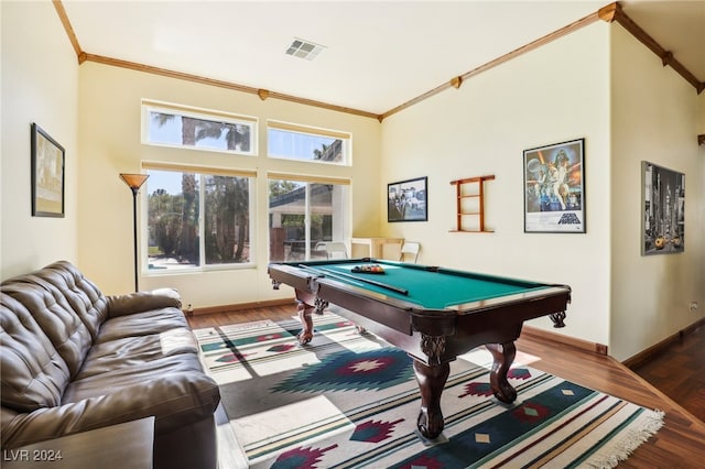 game room featuring dark wood-type flooring, pool table, and crown molding