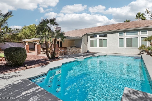 view of pool featuring a patio