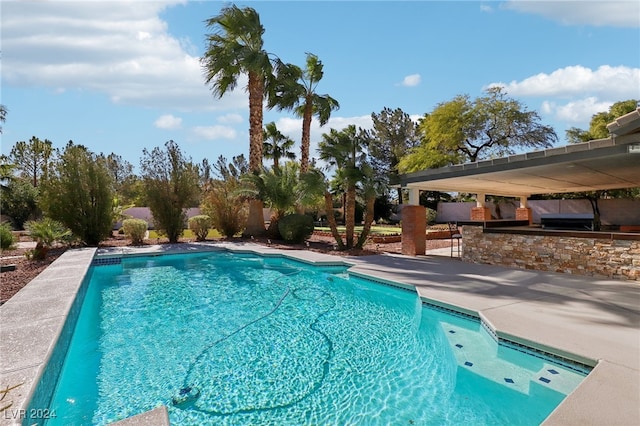 view of swimming pool featuring a patio