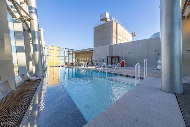 view of pool featuring a patio