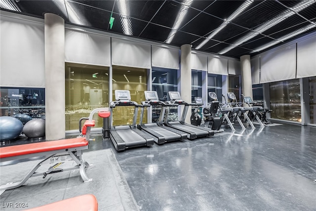 workout area featuring concrete flooring