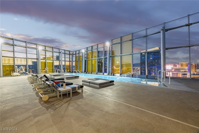 view of patio terrace at dusk