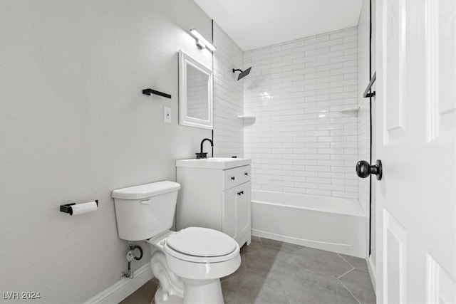 full bathroom with tile patterned flooring, vanity, tiled shower / bath combo, and toilet