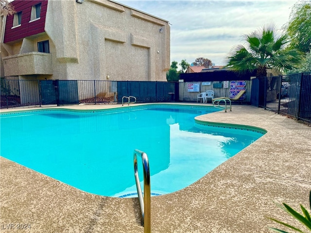 view of pool featuring a patio area