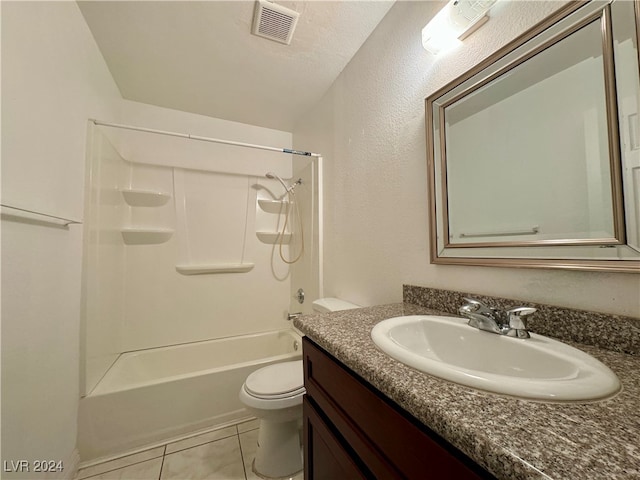 full bathroom featuring tile patterned flooring, a textured ceiling,  shower combination, vanity, and toilet