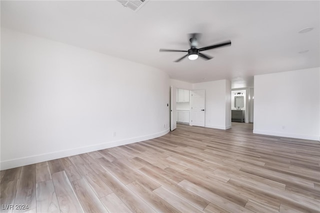 interior space with light hardwood / wood-style floors and ceiling fan