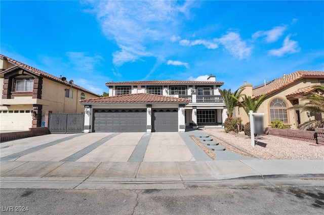 mediterranean / spanish-style house featuring a garage