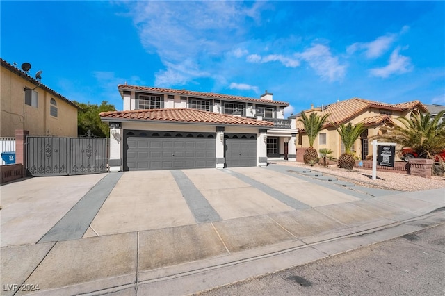 mediterranean / spanish-style house featuring a garage