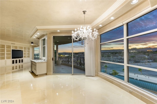 interior space featuring a chandelier and sink