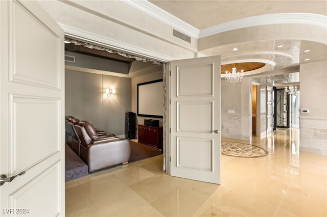 corridor featuring light tile patterned flooring, an inviting chandelier, and crown molding