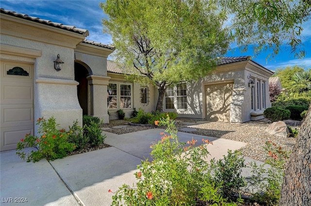 exterior space with a garage