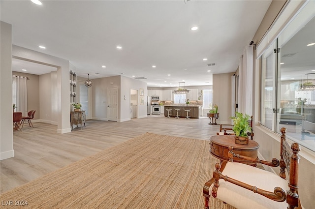 living room featuring light hardwood / wood-style flooring