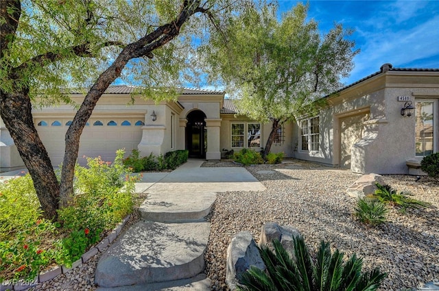 view of front of property featuring a garage