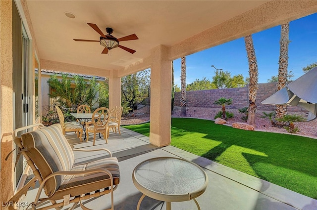 view of patio with ceiling fan