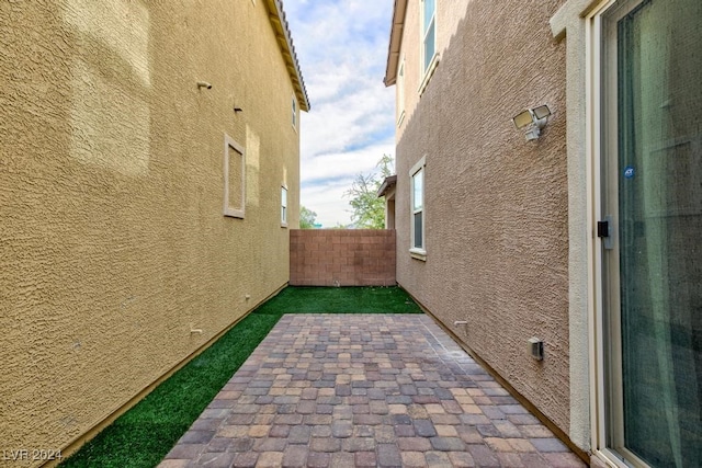 view of home's exterior with a patio area