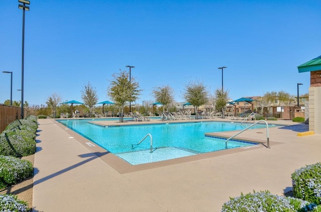 view of swimming pool featuring a patio