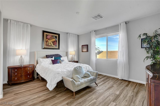 bedroom featuring light wood-type flooring