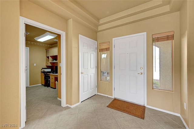 entryway featuring light tile patterned floors