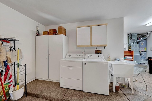 laundry area featuring washing machine and clothes dryer