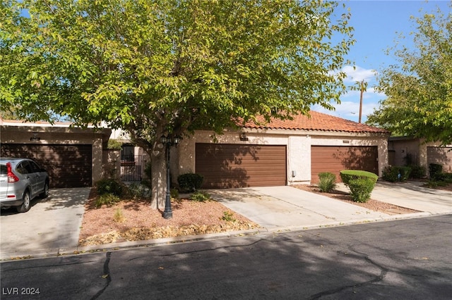 view of front of property featuring a garage