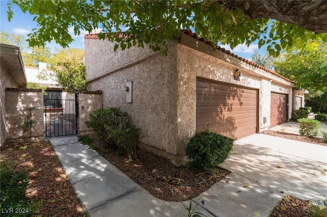 view of home's exterior featuring a garage