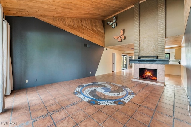 unfurnished living room with a fireplace, tile patterned flooring, high vaulted ceiling, and wooden ceiling