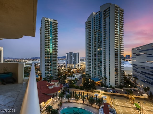 view of balcony at dusk