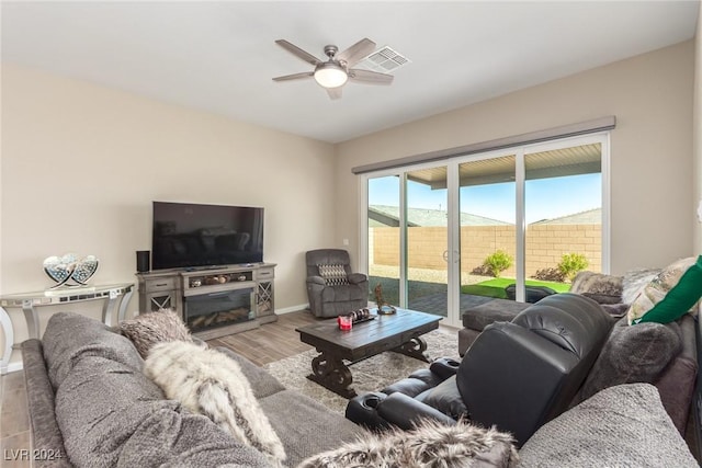 10254 Baronia St, Las Vegas, NV 89141 - living area featuring ceiling fan, wood finished floors, and baseboards
