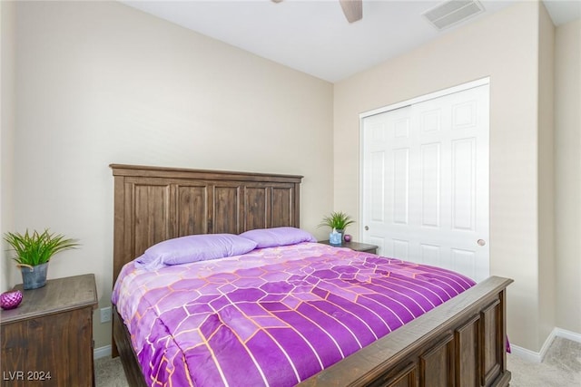 10254 Baronia St, Las Vegas, NV 89141 - bedroom with light carpet, baseboards, a closet, and ceiling fan