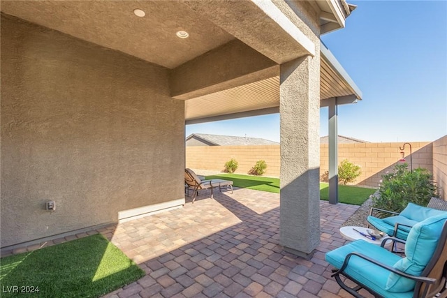 10254 Baronia St, Las Vegas, NV 89141 - view of patio with a fenced backyard