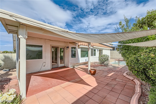 view of patio / terrace featuring french doors