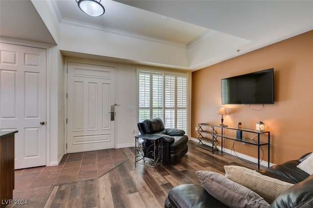 interior space featuring crown molding and dark hardwood / wood-style flooring